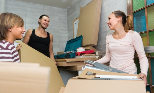 Removal team loading boxes for a Knightsbridge move
