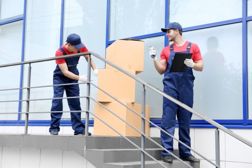 Removal team assessing items for a Knightsbridge move