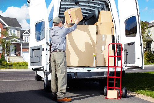 Professional movers handling furniture in a Knightsbridge residence