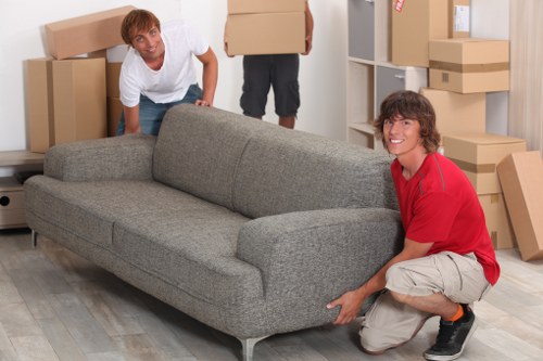 Delicate items being prepared for secure transport by a removals team
