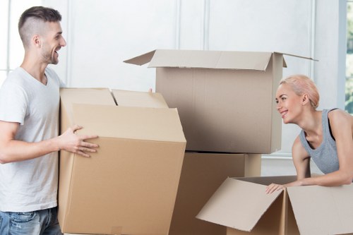 Organized moving process showing careful handling of household items