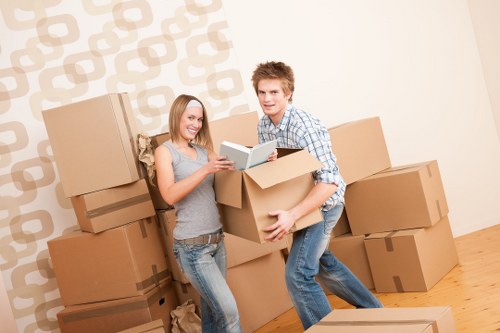 Moving team loading boxes and furniture for a Knightsbridge property relocation